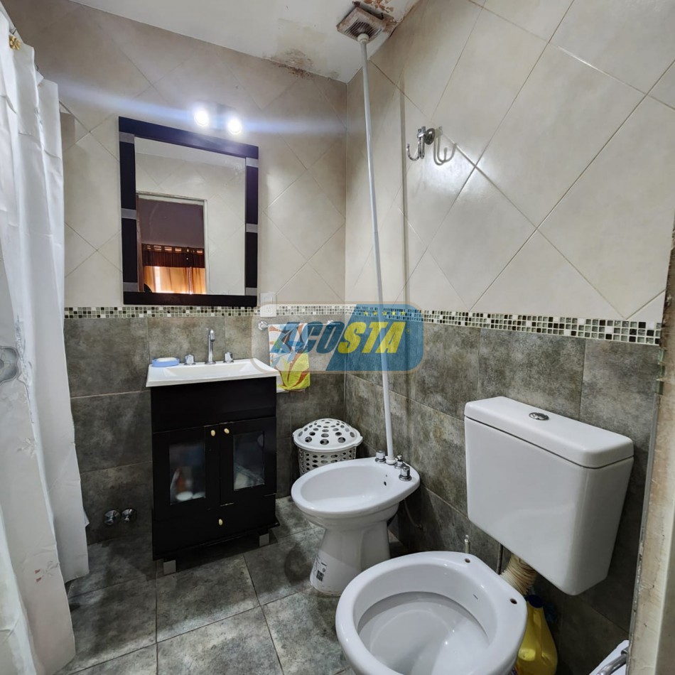TIPO CASA AL FRENTE 
